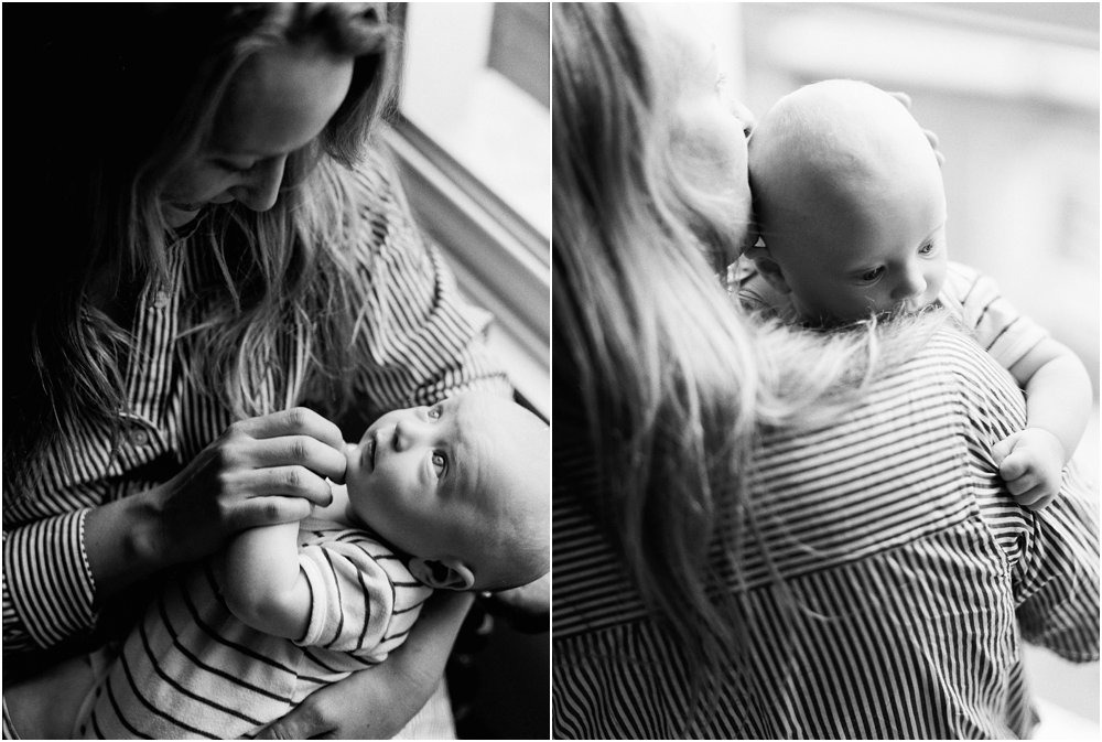 Two images, black and white of mother holding baby, baby looking at mum and looking over shoulder.